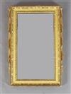 An early 18th century giltwood wall mirror, W.1ft 4in. H.1ft 11in.                                                                     