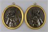 A pair of 19th century French bronze oval relief plaques of Bacchanalian women, overall W.6.75in. H.8.25in.                            