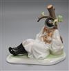 A Zsolnay ceramic model of a young piper boy by a tree height 19cm                                                                     