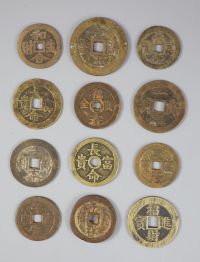 China, 12 bronze or copper charms or amulets, Qing dynasty,                                                                            