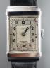 A gentleman's steel Record Watch Co, manual wind wrist watch, on associated leather strap.                                                                                                                                  