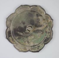 A Chinese bronze mirror, Song dynasty, 16cm diameter                                                                                   