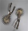 A pair of 19th century Spanish 24-rowel plated spurs                                                                                   