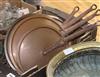 Victorian copper pans and assorted lids                                                                                                