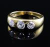 An 18ct gold and gypsy set three stone diamond ring, size O.                                                                           