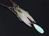 An early 20th century French? glass bead and carved horn cicada pendant necklace,                                                      