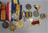 A collection of family medals and other items,                                                                                         