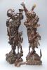 Two early 20th century Chinese hardwood figures of a demon and a fisherman, tallest 61cm                                                                                                                                    