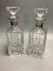 A pair of silver collared cut glass decanters, height 27cm                                                                                                                                                                  