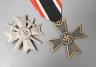 A WW2 German War Merit Cross 1st Class With Swords, stamped 1, a War Merit Cross 2nd Class Without Swords                                                                                                                   