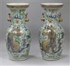 A pair of 19th century Chinese underglaze blue, famille rose celadon ground vases                                                      