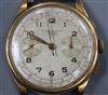 A gentleman's 1950's? Swiss 18k yellow metal chronograph wrist watch,                                                                  