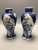 A pair of Chinese blue and white vases, Kangxi mark c.1900, height 22.5cm                                                                                                                                                   