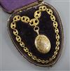 A cased Victorian pinchbeck oval locket on large link chain, locket 50mm.                                                              