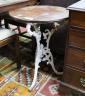 A Victorian cast iron tripod pub table with circular mahogany top, diameter 53cm, height 71cm                                                                                                                               