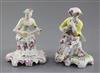 Two Derby 'Pale family' seated figures of musicians, c.1756-9, h. 12.5cm and 12cm, restorations                                        