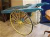 A Victorian blue painted wooden market cart, with yellow spoked wheels W.150cm                                                         