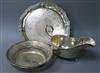 A George V silver sauceboat, a late Victorian silver salver and a pierced silver bowl.                                                 