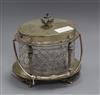 An Edwardian plated mounted cut glass biscuit box and case height 20cm                                                                 