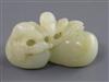 A Chinese pale celadon jade carving of two ducks biting lotus, 19th century L. 5.3cm                                                   