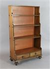 A Victorian mahogany waterfall bookcase, W.2ft 5in. D.1ft 1in. H.4ft 2in.                                                              