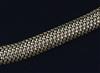 A stylish 14k gold interwoven link demi-lune bracelet, 20cm.                                                                           