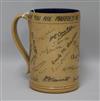 A Doulton Lambeth presentation mug, incised with signatures of the factory workers on the marriage of the 'Baron@ H.16.5cm.            