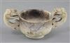 A Chinese cream and black jade two handled cup, 16th/17th century, width 13cm                                                          