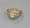 A modern 18ct gold and single stone diamond ring with diamond set setting and shoulders, size M                                        