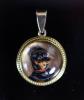 A Victorian gold mounted Essex crystal circular pendant, decorated with a terrier dog                                                                                                                                       