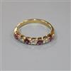 An 18ct gold, seven stone ruby and diamond half hoop ring, size P/Q.                                                                   