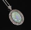 An antique gold, white opal and diamond cluster oval pendant, on a later 9ct white gold chain, pendant 24mm.                           