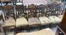 A set of fourteen 19th century Continental carved oak dining chairs                                                                                                                                                         