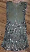 A 1920's silk and sequin dress                                                                                                         