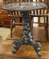 A carved tripod table W.55cm                                                                                                           