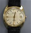 A gentleman's 9ct gold Bulova automatic wrist watch.                                                                                   