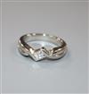 A platinum and solitaire princess cut diamond ring, size I/J.                                                                          