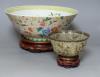 A Chinese plique a jour enamel bowl on stand, and a Chinese famille rose bowl on stand, largest 33cm diameter                                                                                                               