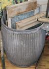 A collection of wash boards and a galvanised tin wash tub                                                                              