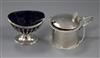 A George V silver mustard pot and an Edwardian silver salt.                                                                            