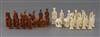 A rare 18th century white and brown walrus ivory Russian chess set, featuring Russians against Persians, in mahogany box,              