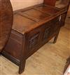 An 18th century oak coffer W.131cm                                                                                                     