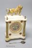 A Victorian alabaster mantel clock, with gilt metal lion surmount, French skeleton movement with pendulum, 34cm                                                                                                             