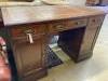 An Edwardian mahogany kneehole desk                                                                                                                                                                                         