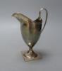 A George III silver helmet shaped cream jug, I.B, London, 1800, 14.9cm                                                                                                                                                      