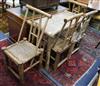 4 bamboo chairs and table W.110cm.                                                                                                     