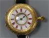 A late 19th century continental 18ct gold wrist watch (converted fob watch?).                                                          