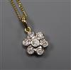 A modern 18ct gold and seven stone diamond cluster drop pendant, on an 18ct gold fine link chain, pendant 11mm.                        