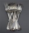 A set of eight William IV silver fiddle pattern table forks, London, 1835 and four similar forks, 30 oz.                               