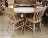 A pine table and four chairs W.105cm                                                                                                   